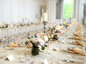 Wedding Planner tressle table rose centrepiece